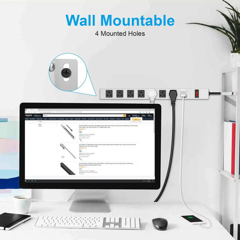 Heavy Duty Metal 8 Outlet Power Strip With 1200J Surge Protector mounted on office wall with a desk setup