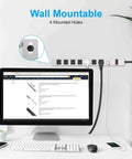 Heavy Duty 8 Outlet Power Strip With Mountable Design, 1200J Surge Protector shown wall-mounted near desk setup