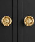 Dope Vintage Solid Brass Ring Pull Drawer Knobs Set Of 20 In Satin Gold Finish With Antique Bronze Accents on black cabinet
