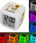 Totally Sweet Farm Sunflower Cube Digital Alarm Clock With Silent Sweep Snooze Function And Chill Nightlight colors showing time and date.