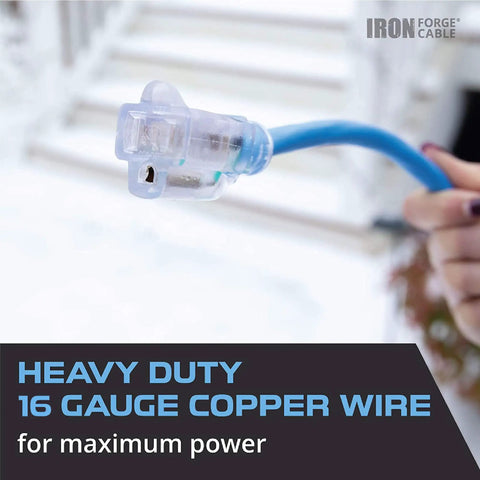 Person holding All Weather Outdoor Extension Cord 25 Ft Heavy Duty Lighted 3 Prong 16/3 SJEOW, showcasing blue cable