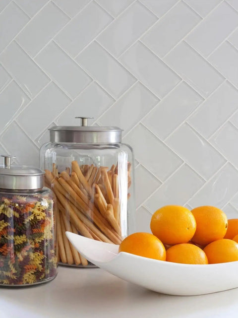 Close-up of Easy DIY Peel and Stick Glass Backsplash Tiles for Kitchen or Bathroom, Subway White 3x6 Inch Glass Tiles in use.