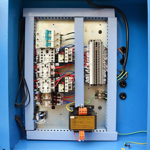Control panel inside Heavy Duty Electric Hydraulic Pipe Tube Bender Machine featuring relays and wiring for operation.