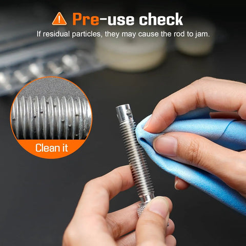Cleaning a rod from the Watch Press Tool Set Back Case Closer For Closing The Back Cover And Battery Replacement Opener Remover Repair Kit.
