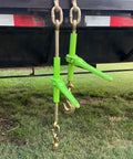 4 Pack 5/16 To 3/8 Inch Heavy Duty Hi Vis Green Ratchet Tie Down With Grab Hook And Slip Clip 5400 Lb working on flatbed trailer.