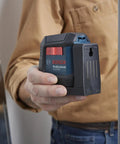 Rechargeable Self Leveling Cross Line Laser With Dual Power Options AA Batteries Or Li Ion Pack IP55 Rugged Jobsite Ready Bright Fine Line Projection For Precise Layouts Quick Setup And Durable Build held for layout marking