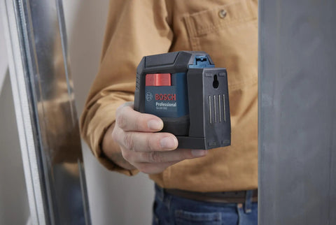 Rechargeable Self Leveling Cross Line Laser With Dual Power Options AA Batteries Or Li Ion Pack IP55 Rugged Jobsite Ready Bright Fine Line Projection For Precise Layouts Quick Setup And Durable Build held for layout marking