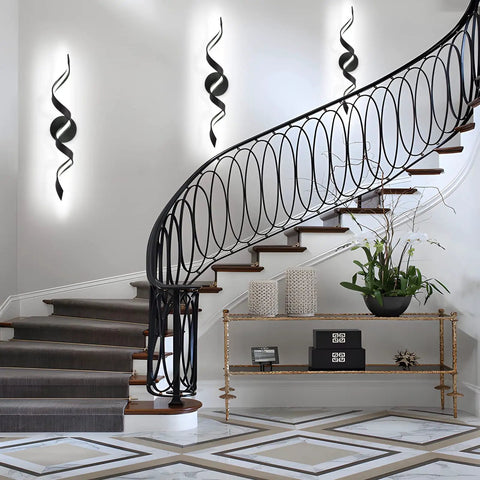 Dimmable 24 Inch Black LED Vanity Light With Dope Spiral Design For Over Mirror Install Modern Bath Lighting Fixture 15W Low Profile 6000K Daylight White Wall Mount installed on white wall beside staircase