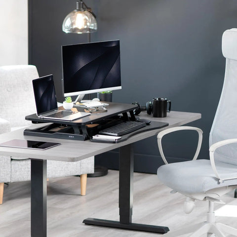 32 Inch Desk Converter K Series Sit To Stand Riser With Dual Monitor And Laptop Workspace Height Adjustable Standing Desk Attachment Wide Keyboard Tray Black DESK V000K on office desk.