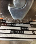 Close-up of Heavy Duty Semi-Automatic Industrial Stamping Printer Machine marking device showing engraved numbers on metal plate.