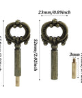 Two antique-brass lamp turn knobs with 1/2in extension for table/floor lamps (front view).