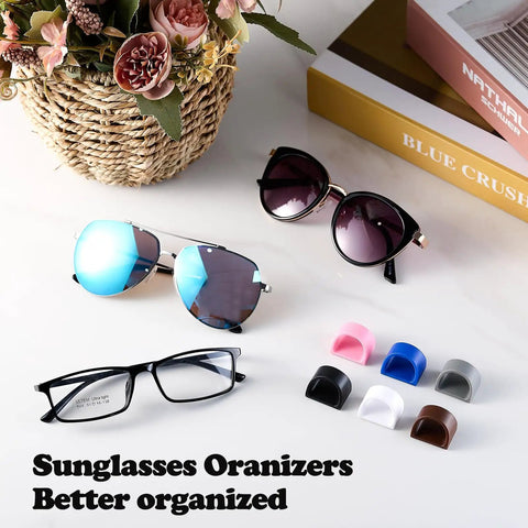 Assorted sunglasses with Six Pack Sunglasses And Eyewear Organizer Glasses Holder For Sunglasses And Reading Glasses Space Saving Wall Mount Or Desk Rack For Home Office Car Workshop Keeps Eyewear Neat And Accessible Ready To Grab Black on table.