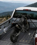 Heavy Duty Ratchet Straps 1.5 Inch By 15 Feet Locking S Hooks 5208 Lbs Break Strength securing a motorcycle in a truck bed.