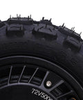 Close-up of Beefy 11 Inch 5000W Brushless Hub Motor for Electric Scooters and Bikes showcasing tire tread and hub design.
