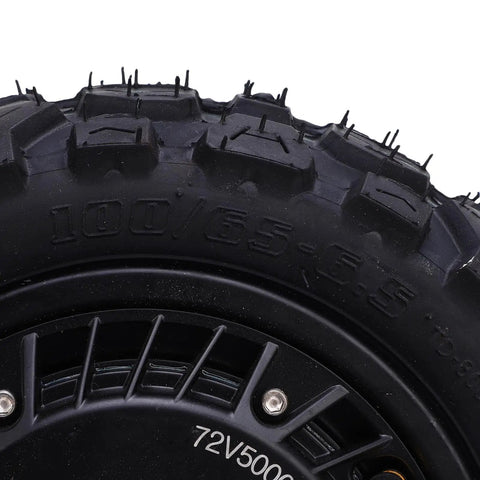 Close-up of Beefy 11 Inch 5000W Brushless Hub Motor for Electric Scooters and Bikes showcasing tire tread and hub design.