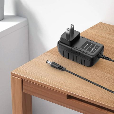 Top Shelf Replacement AC Adapter For Skil And Bosch Handheld Power Tools Straight 6V Output Charger on wooden table with plug.