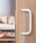 Offset Door Pull Handle 10 Inch Center To Center Length 1 Inch Diameter Aluminum 90 Degree Through Bolt Mount installed on wooden door