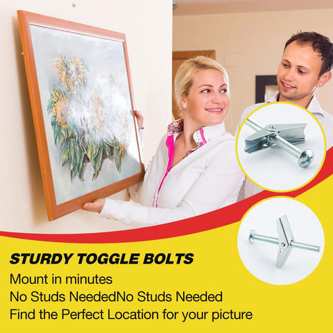 Couple using Heavy Duty One Quarter Inch Drywall Anchors and Screws Kit With 20 Toggle Bolts to hang a framed picture on a wall.
