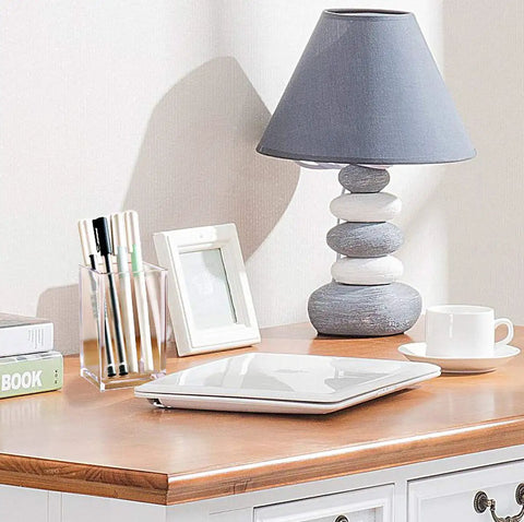 Clear Acrylic Pencil Pen Holder Cup Set 2 Pack for Desk Accessories Storage on a wooden desk with books and a lamp