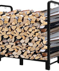 Heavy Duty 4 Foot Firewood Rack For Indoor And Outdoor Use, full of stacked logs, black steel frame, adjustable wood holder.