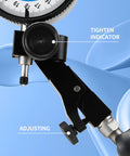 Dasqua magnetic base dial indicator holder in black metal with swivel clamp and fine adjustment knob (front view).