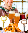 Two metal bottle opener inserts with threaded stems in gold and bronze finishes.