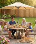 Family dining under 9Ft Outdoor Patio Umbrella With Heavy Duty Base Included Push Button Tilt And Crank UV Protected Canopy in tan.