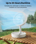 Foldable Desk Fan With LED Night Light 6.8 Inch Wireless Portable Fan on wooden table outdoors