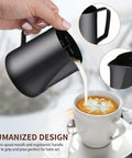Sturdy Stainless Steel Milk Frothing Pitcher 12 Oz 350 Ml With Barista Grade Latte Art Pen For Espresso Machines Coffee Frother Cup Black Dishwasher Safe And Latte Art Decorating Tool pouring milk into coffee