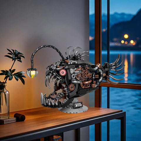 Angler Fish Mechanical Building Block Set With Lights Dope STEM Toy for Kids and Adults displayed on desk at night