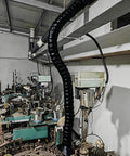 Heavy Duty Fume Extraction Arm With Articulated Duct Hose And Nozzle installed in industrial setting, 100cm length