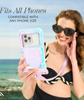 Woman holding IP68 Waterproof Phone Pouch with Floating Lock Seal in Iridescent Soap Bubble Finish at the beach.