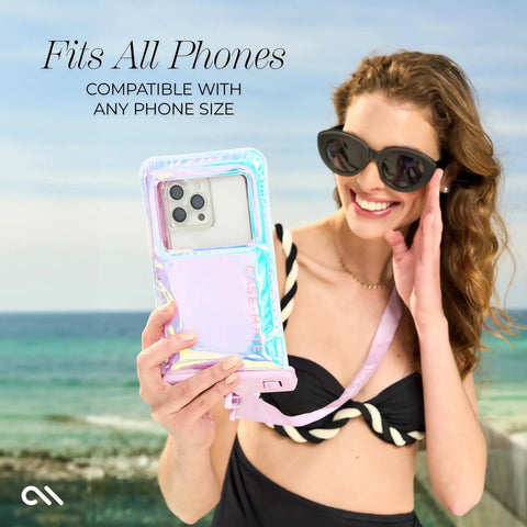 Woman holding IP68 Waterproof Phone Pouch with Floating Lock Seal in Iridescent Soap Bubble Finish at the beach.