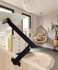 2-Pack Black Lid Support Hinges installed on wooden cabinet showing rotatable folding lid in modern room