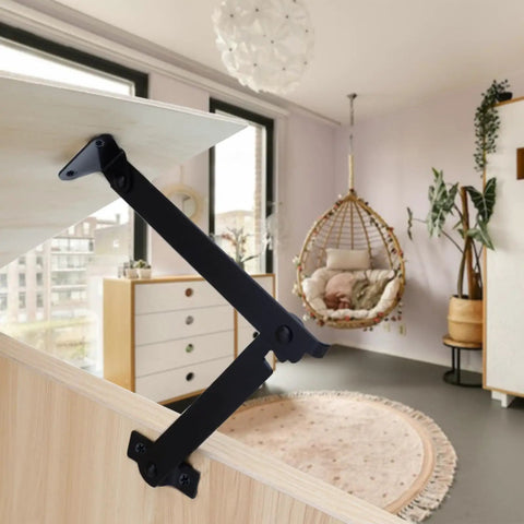 2-Pack Black Lid Support Hinges installed on wooden cabinet showing rotatable folding lid in modern room