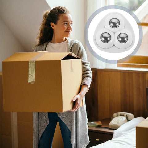 Adhesive Ball Caster Wheels For Furniture Flat Mount ABS Material 20 Lbs Load Per Wheel shown next to a woman carrying a box.