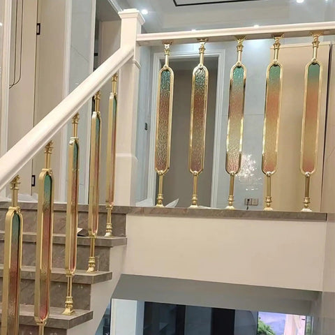 Gold Aluminum Stair Balusters With Tempered Glass Sleek Deck Post Railing No Sweat Install Staircase Rail Replacement 10 Pack 33 5 Inch installed on staircase.
