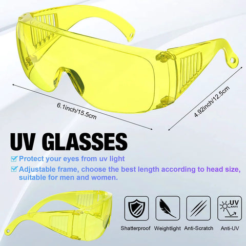 Angled front view of yellow UV protective safety goggles with vented side panels