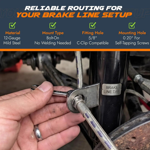 Close-up of Beefy Bolt On Brake Line Tabs Mounting Brackets For 5/8 Inch Line Fittings installed on a steel tube with hand adjusting.