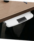 Under Desk Keyboard Tray With Slick Glide Mechanism And Ergonomic Wrist Rest For Smooth Typing Sessions Adds Workspace Flex and Solid mount visible under a wooden desk.