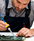 Man using Beast DIY 80W Soldering Gun Kit With Adjustable Temperature From 180 To 500 Celsius on a circuit board for electronics repair