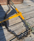 4 Pack Heavy Duty Ratchet Lever Load Binders With Grab Hooks, 12,000 Lb Working Load Limit, powder coated yellow binder on trailer