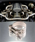 Stainless Steel Exhaust Band Clamp 48 51mm Heavy Duty Replacement For Motorcycle Water Hoses And Car Exhaust Pipes displayed on engine