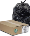 Heavy Duty 56 Gallon Black Trash Bags 100 Count in a box with one bag tied, ideal for large indoor and commercial cleanup.