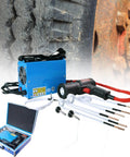 Handheld 1500W Induction Bolt Remover For Gunked Up Fasteners Flameless Heater with accessories and case next to textured tire.