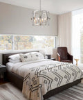 Brushed Nickel Drum Pendant Chandelier For Dining Room 4 Light Modern Round Fixture in a stylish bedroom setting.