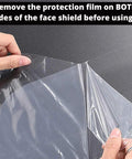 Person peeling protective film from Clear Full Face Shield Mask Pack Of 2 Anti Fog Protective Shield For Eyes Nose And Face With Transparent Visor Great Optics For Indoor Outdoor Work Everyday Use.