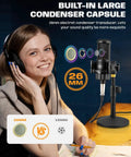 Woman with headphones next to Gold 26mm Large Diaphragm Condenser Microphone Kit With Cardioid Capsule on metal desk stand.