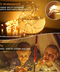 24 Pack Battery Operated Fairy Lights With 3 Modes illuminating in mason jar and with children in tent, 7 ft silver wire