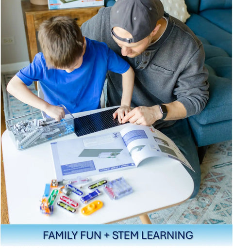 Child and adult using BRIC Structures Electronics Exploration Kit For Kids 8 Plus With 140 Plus BRICs on table.
